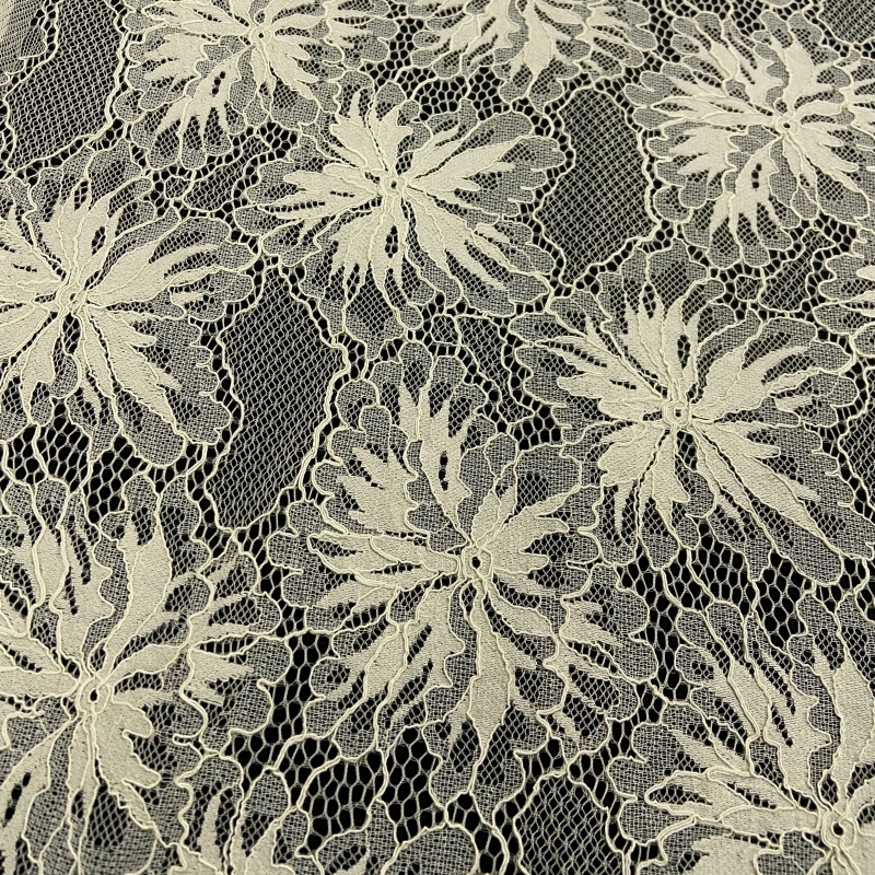 Lace featuring a delicate leaf border