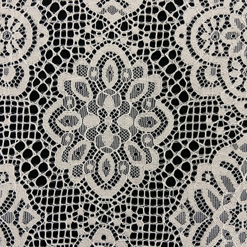 Lace with art nouveau swirl motifs