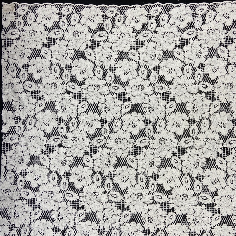 Embroidered vine pattern on sheer lace
