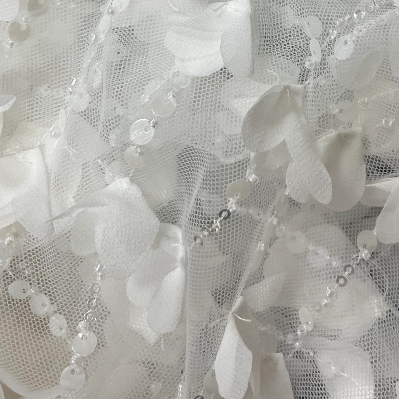 Sequined lace with floral vine pattern