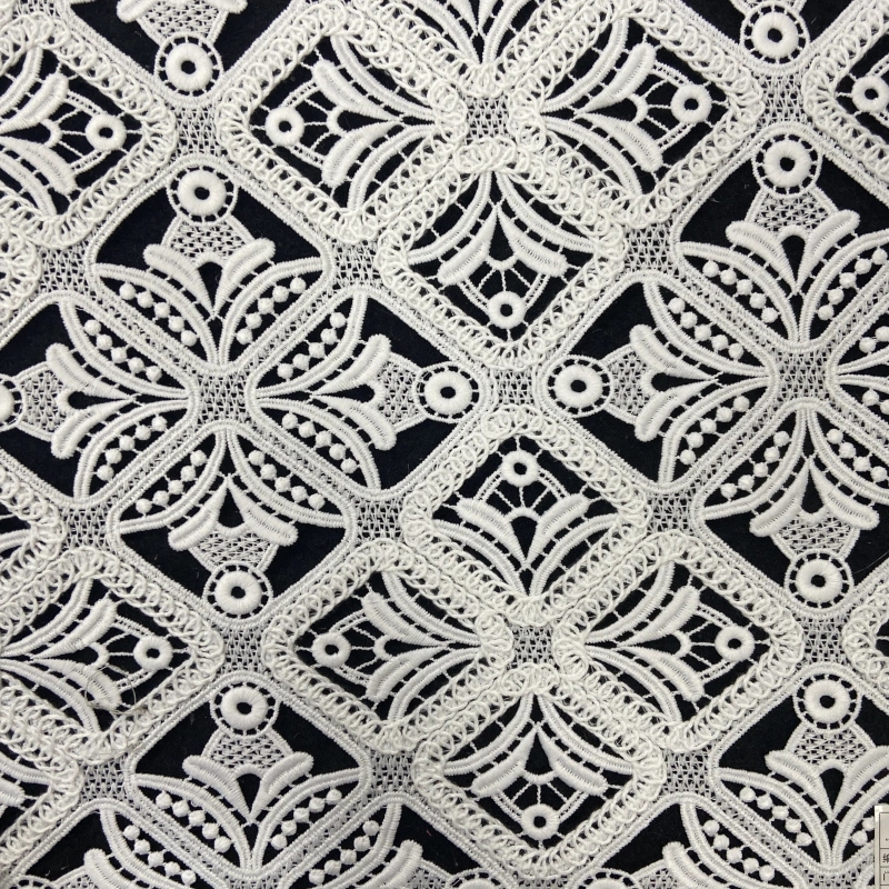 Embroidered scalloped lace edging