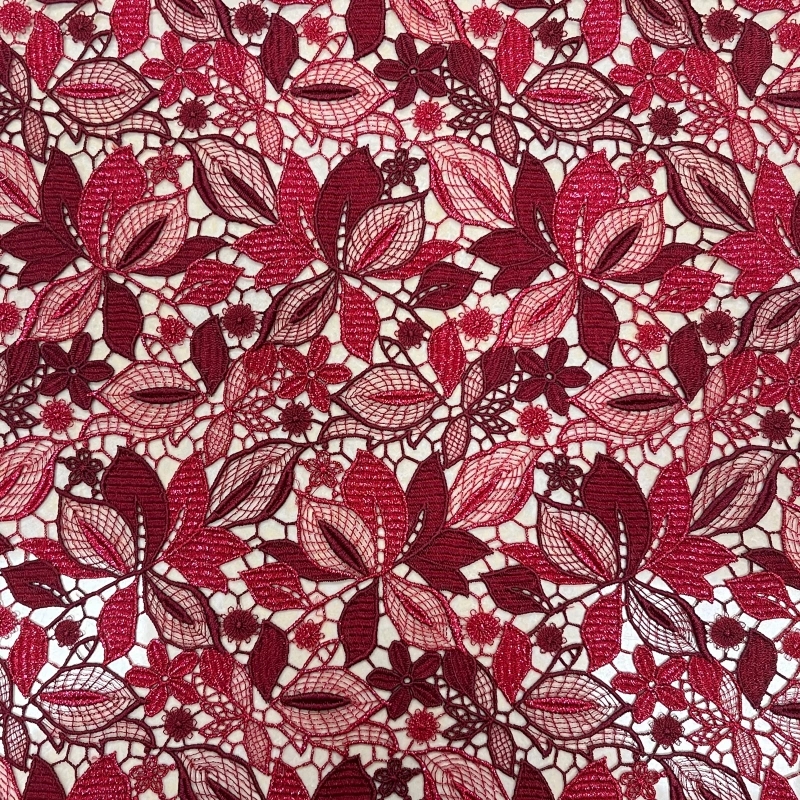 Embroidered lace with geometric fill