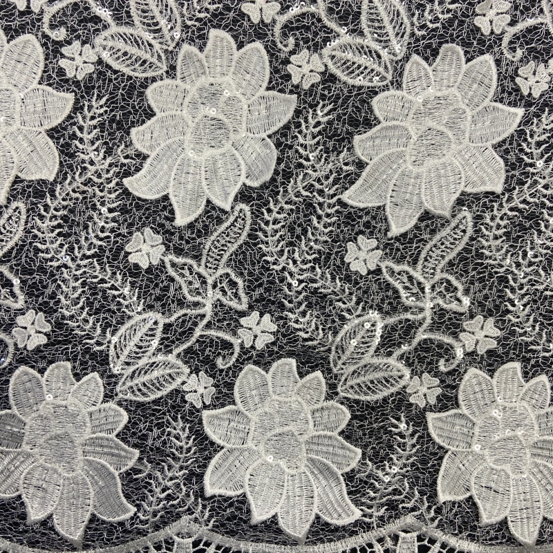 Scattered blossom embroidery on net