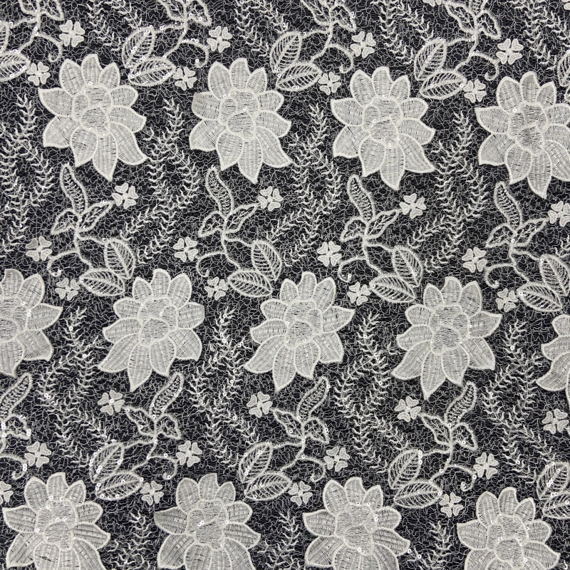 Sheer lace with embroidered vine border