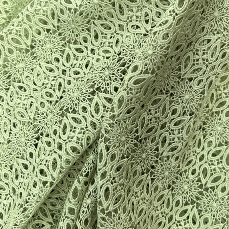 ornate scalloped lace fabric design